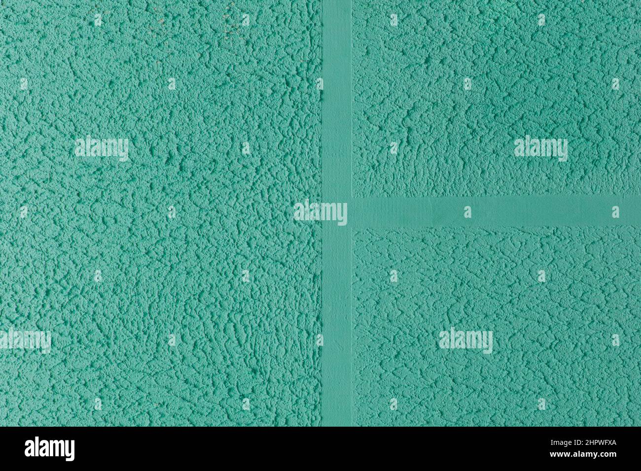 Verde acquamarina turchese azzurro gesso parete astratto motivo struttura grossolana superficie fondo ruvido stucco. Foto Stock