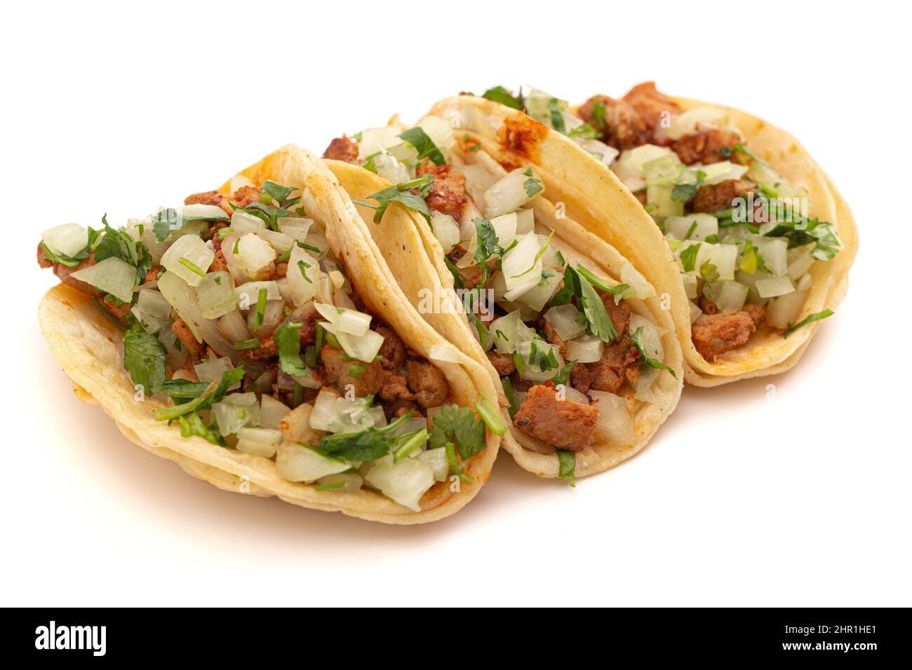 Tre Chicken Street Tacos isolato su uno sfondo bianco Foto Stock