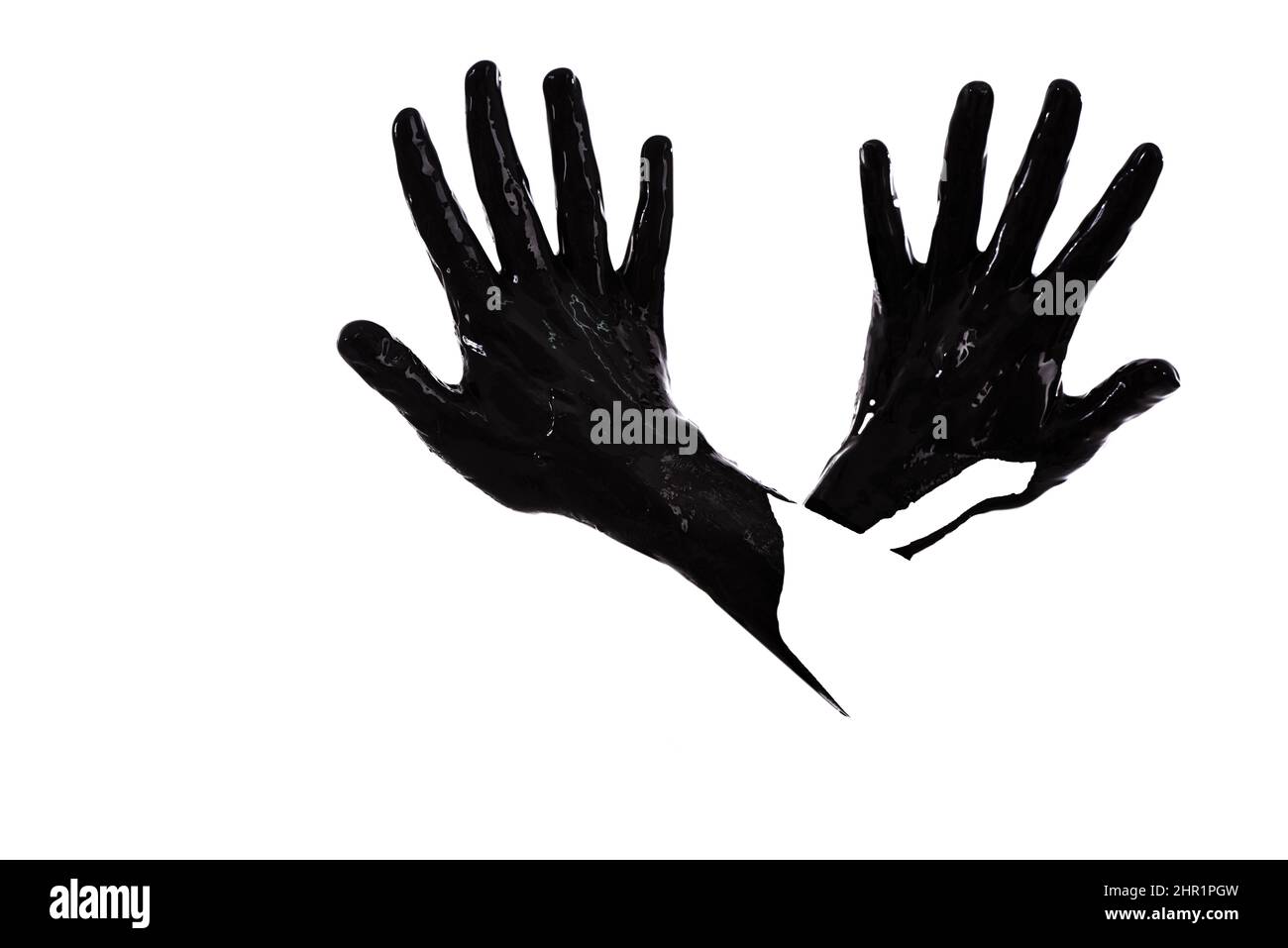Non posso toccare questo. Scatto di mani dipinte di nero completamente aperto e isolato su bianco. Foto Stock