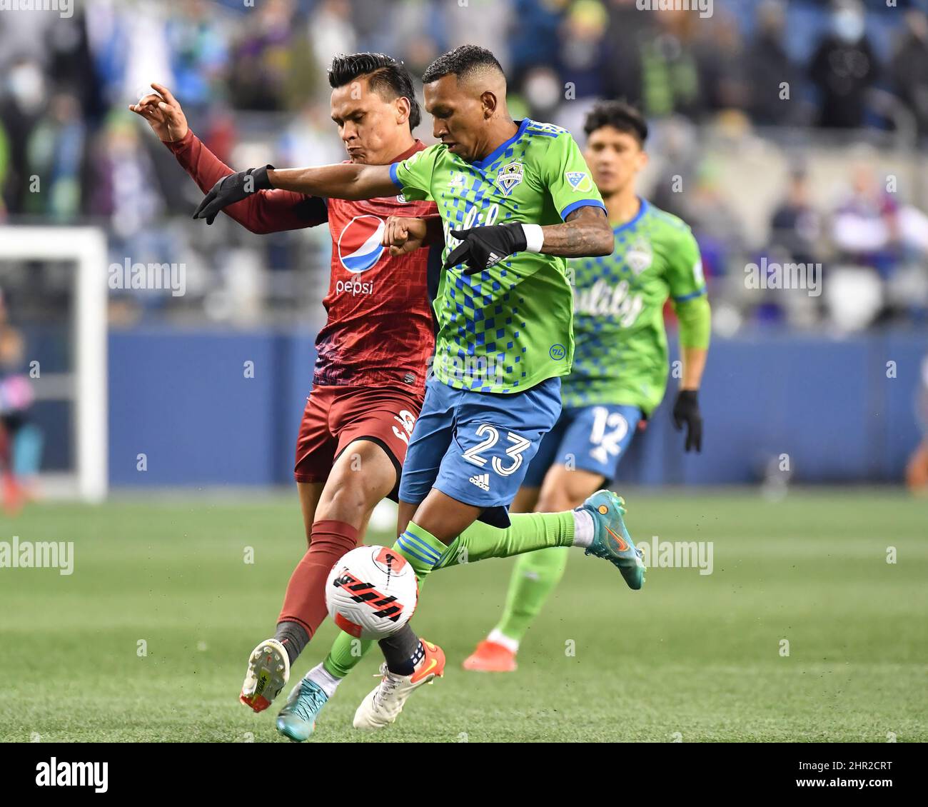 24 febbraio 2022: I Seattle Sounders avanzano le battaglie di Leo Chu per far avanzare la palla durante la partita di calcio MLS tra il FC Motagua e i Seattle Sounders al Lumen Field di Seattle, WA. Seattle sconfisse Motagua 5-0. Steve Faber/CSM Foto Stock