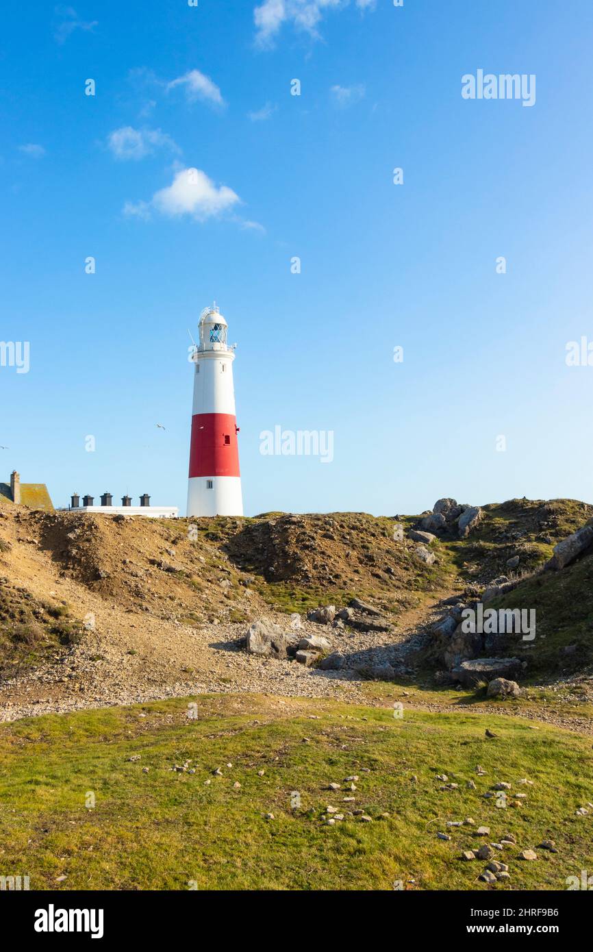 Faro a strisce rosse e bianche sull'isola di Portland, Portland Bill Foto Stock