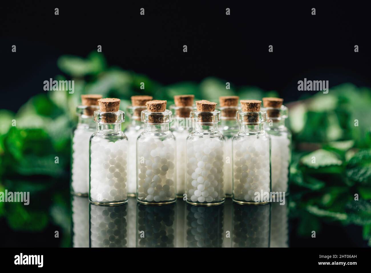 Pillole omeopatiche in bottiglia Foto Stock