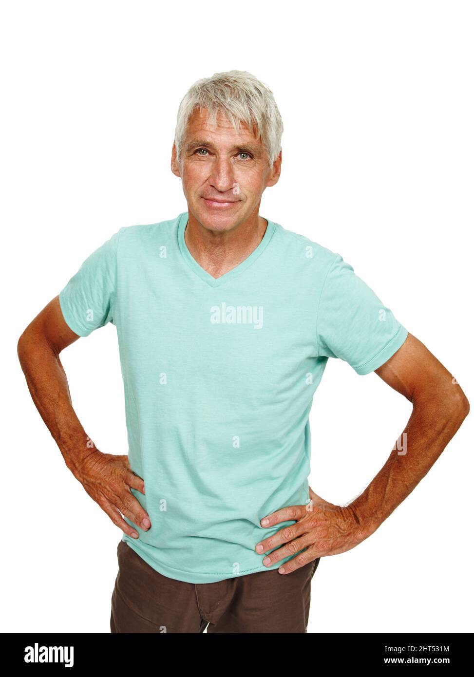 Sicurezza con un po' di esperienza. Studio girato di un uomo maturo con le mani sui fianchi. Foto Stock