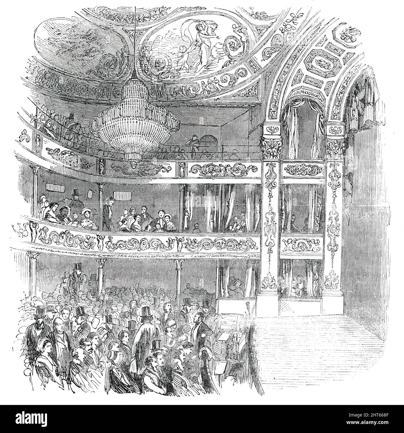 Interno del nuovo Teatro Olimpico, Strand, [Londra], 1850. '...questo nuovo Teatro, che è risorto, come a phoenix, dalle ceneri della vecchia casa, distrutto dal fuoco nel marzo scorso... ha la forma di una scarpa da cavallo allungata, con poche proiezioni, in modo da non presentare alcuna interruzione alla vista o al suono. I sedili Pit sono circolari in piano, in modo che ogni persona si guardi direttamente al centro del palco. Il soffitto e il promenium sono abbarinate a bordo, e involta per decorazioni. L'altezza dal pavimento Pit alla parte più alta del soffitto è di circa 36 piedi. Le bancarelle contengono 38 sedute; il Foto Stock