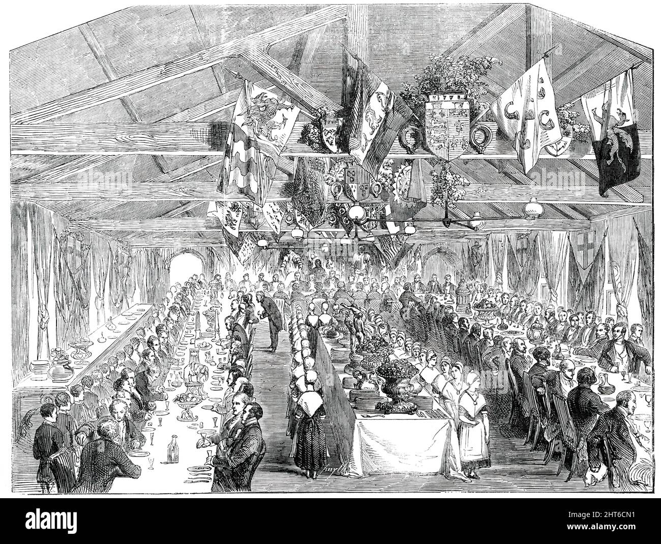 Cena giubilare delle Scuole di Carità parrocchiale di Clerkenwell, [Londra], 1850. 'Le scuole sono state fondate... allo scopo di educare e di educare i bambini dei poveri della parrocchia di Clerkenwell...from 500 a 600 bambini sono stati in presenza quotidiana, di cui 105 ragazzi e 70 ragazze sono vestiti così come educati... i ragazzi sono istruiti nella lettura, nella scrittura, e aritmetica; e le ragazze, inoltre, nel lavoro di ago. La sala della scuola superiore, in cui si è svolta la cena, è un edificio spazioso ma semplice...gli ospiti erano 150...i bambini più anziani, i ragazzi e le ragazze, prendendo un Foto Stock