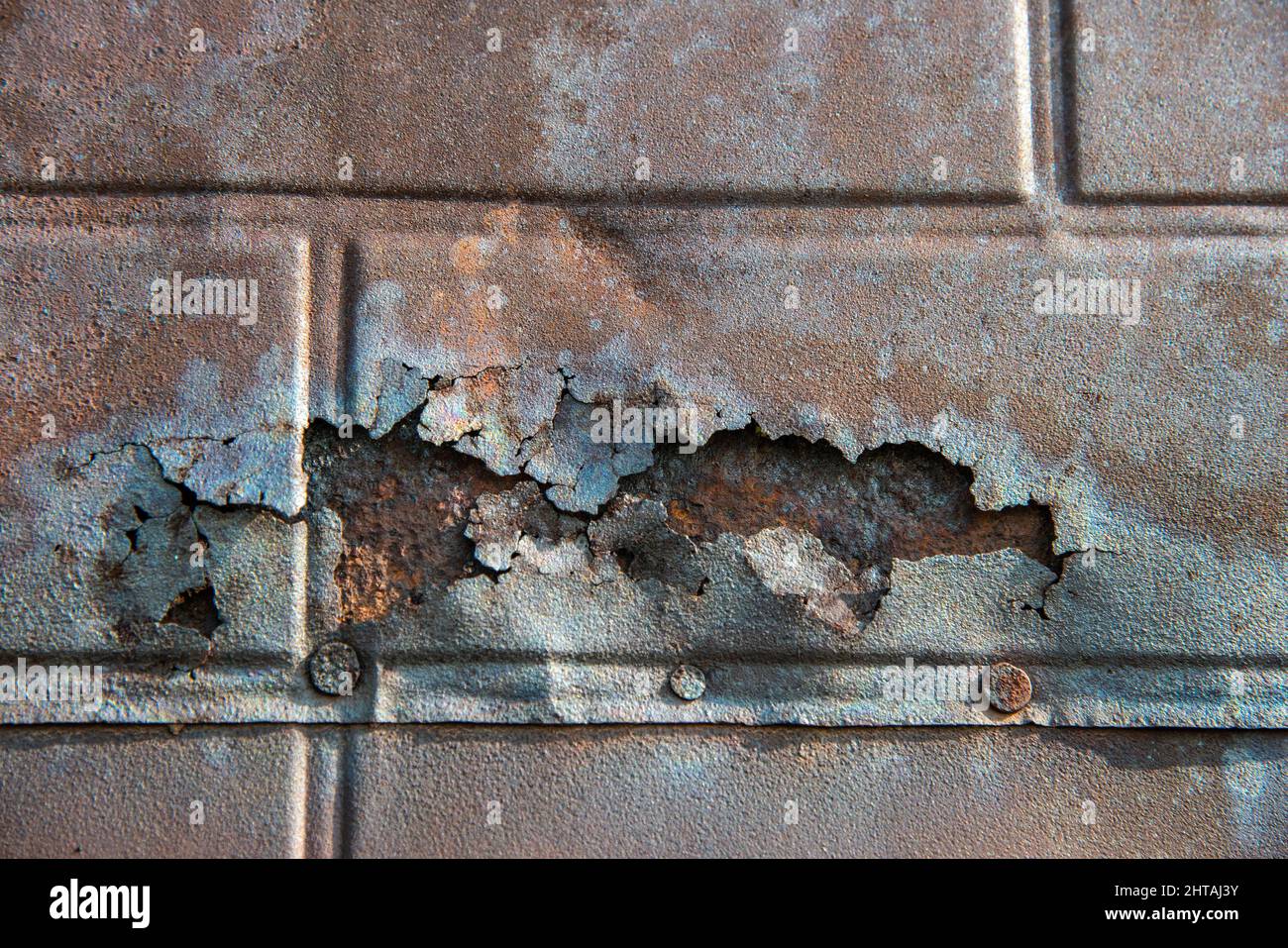 metallo arrugginito usato come sede Foto Stock
