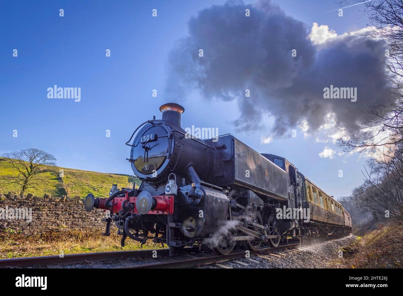 GWR 1500 classe 0-6-0PT shunting motore numero 1501 dalla Severn Valley Railway trasporta un treno per Irwell vale Halt sulla East Lancashire Railway d Foto Stock