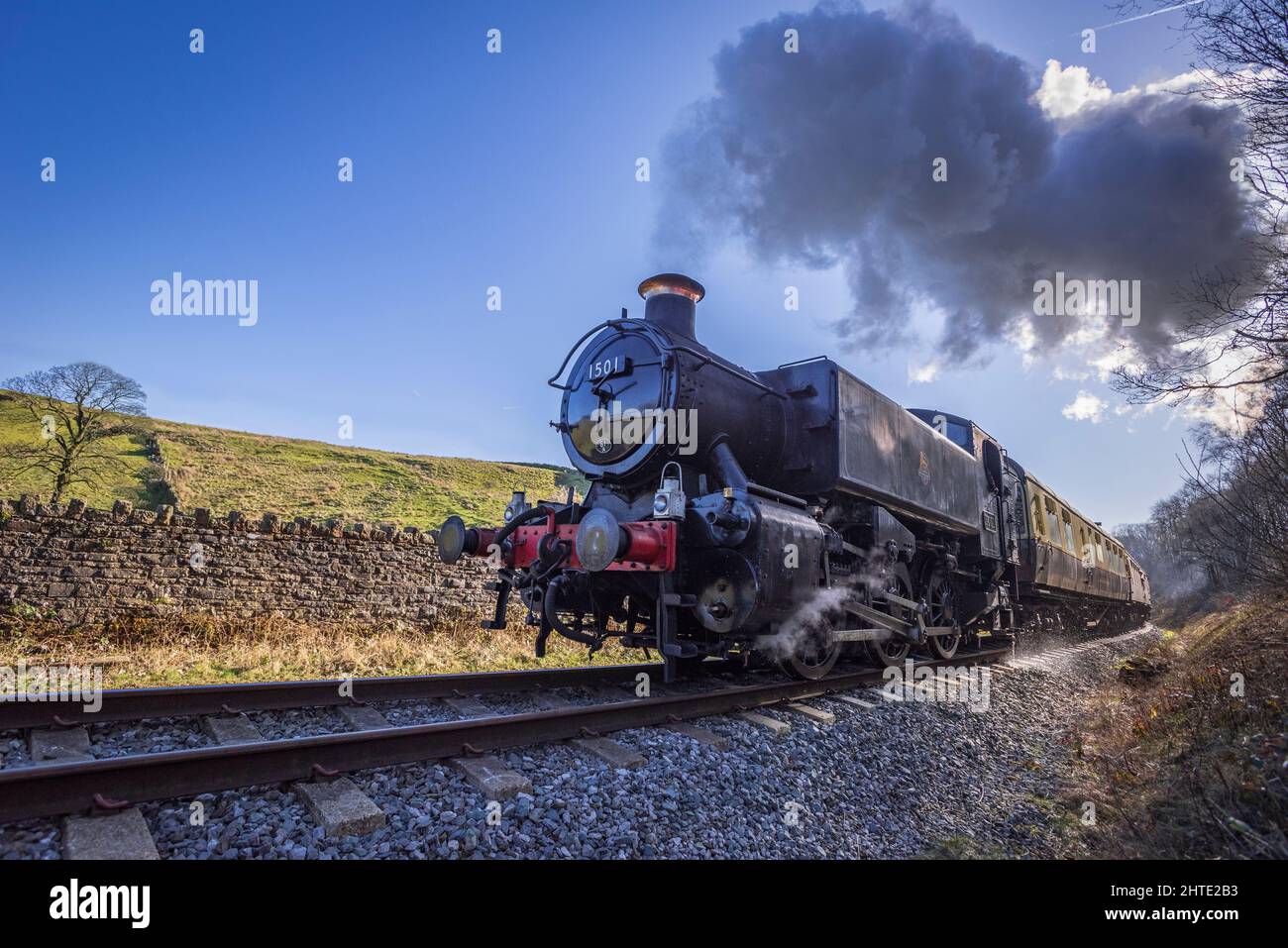 GWR 1500 classe 0-6-0PT shunting motore numero 1501 dalla Severn Valley Railway trasporta un treno per Irwell vale Halt sulla East Lancashire Railway d Foto Stock