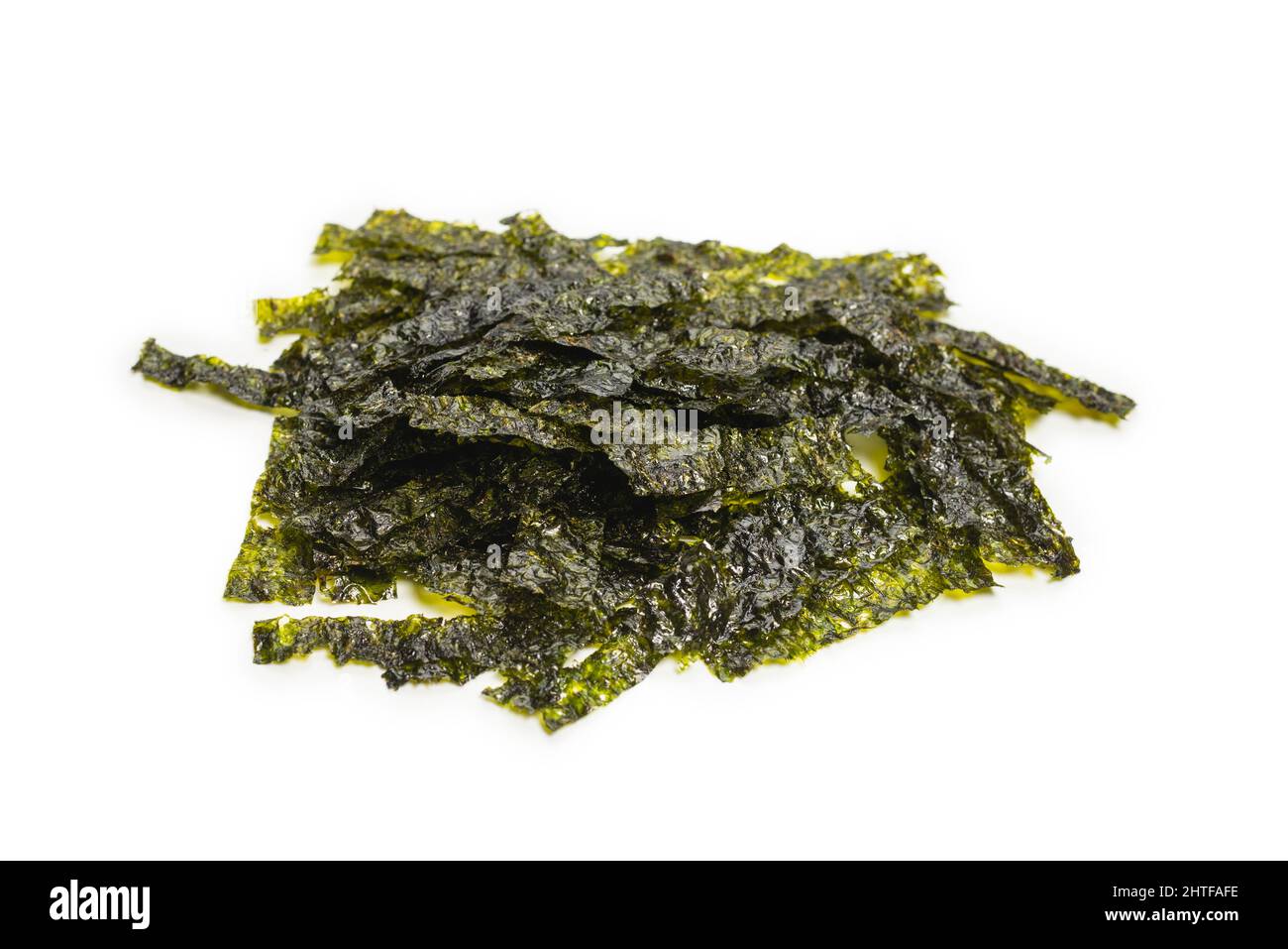 Saporite alghe nori isolate su sfondo bianco Foto stock - Alamy