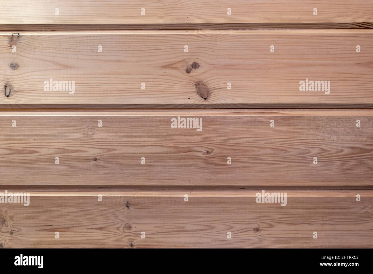 Legno texture sfondo. Particolare della parete della sauna. Foto Stock