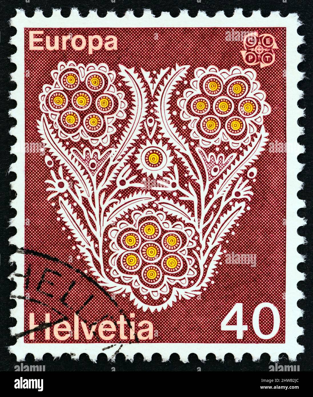 SVIZZERA - CIRCA 1976: Un francobollo stampato in Svizzera dal numero 'Europa' mostra l'Ricamo floreale, circa 1976. Foto Stock