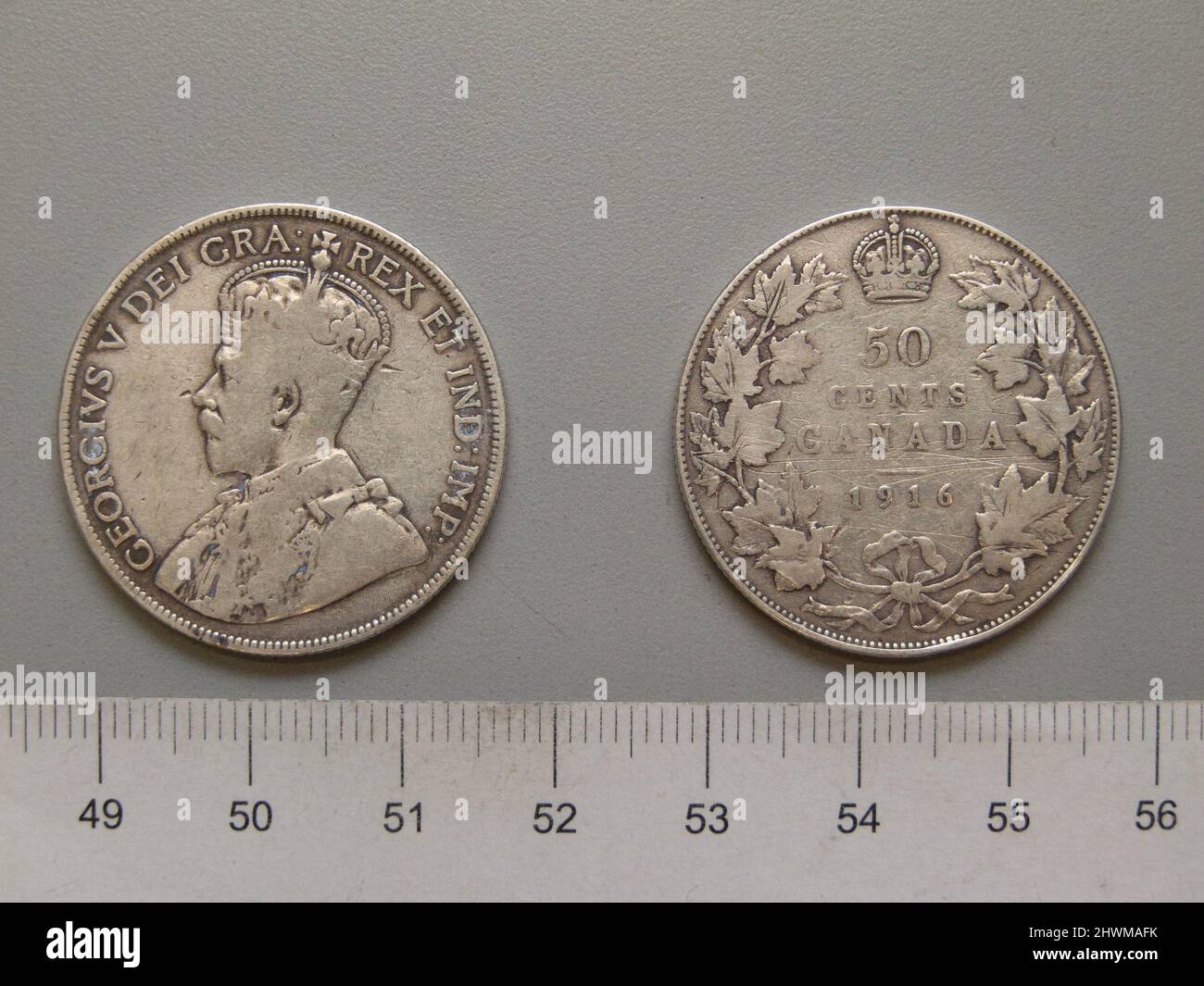 50 centesimi da Ottawa con George V, re di Gran Bretagna. Oggetto: George V, King of Great Britain, British, 1865–1936 Mint: Ottawa Artist: Sir Edgar Bertram MacKennal, Australian, 1863–1931 Artist: William Henry James Blakemore, British, 1871–1945 Foto Stock