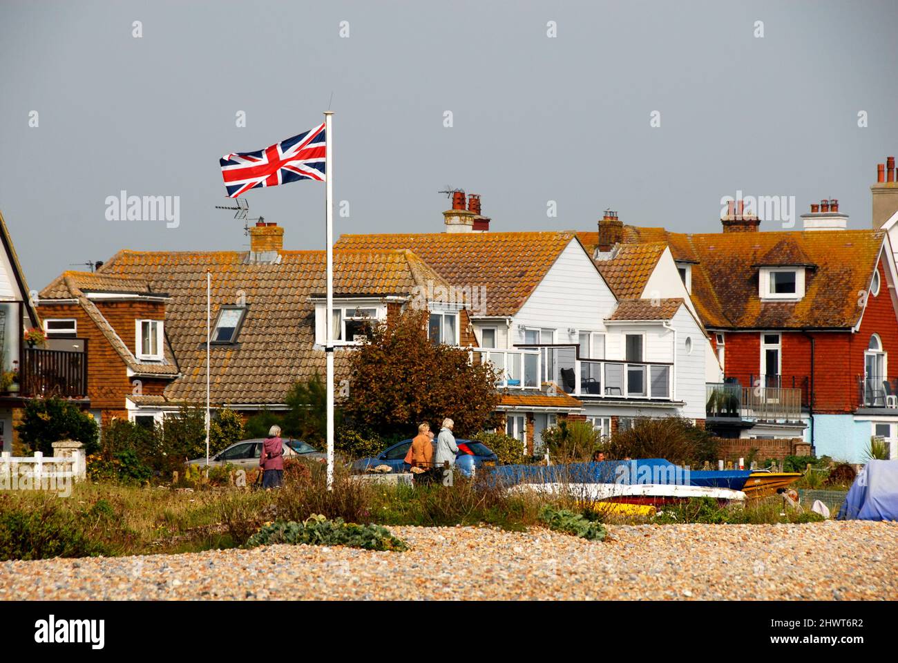 Case di mare sulla spiaggia, East Sussex, Inghilterra Foto Stock