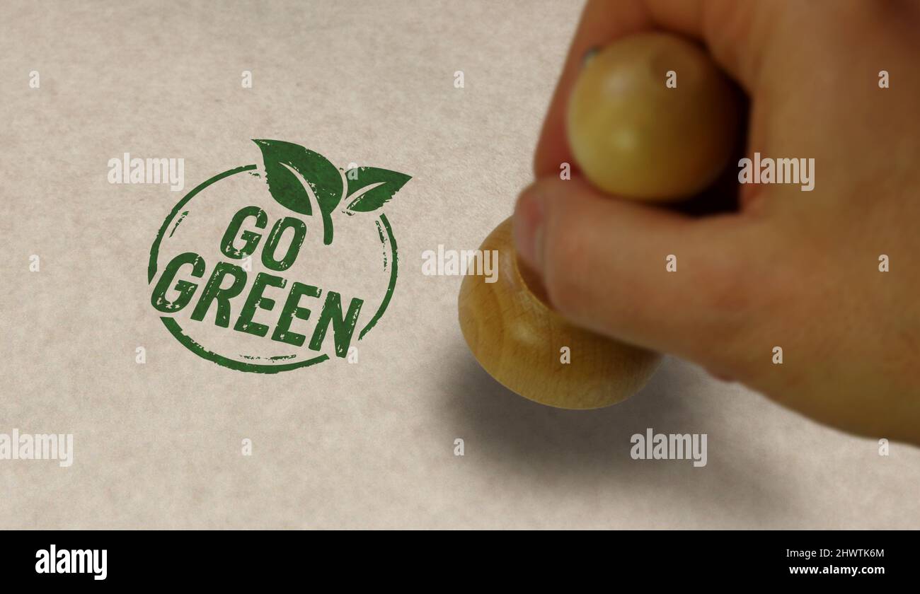 Vai verde ed eco-friendly simbolo timbro e la mano di stampaggio. CO2 concetto neutro, ecologia, ambiente, natura e clima. Foto Stock