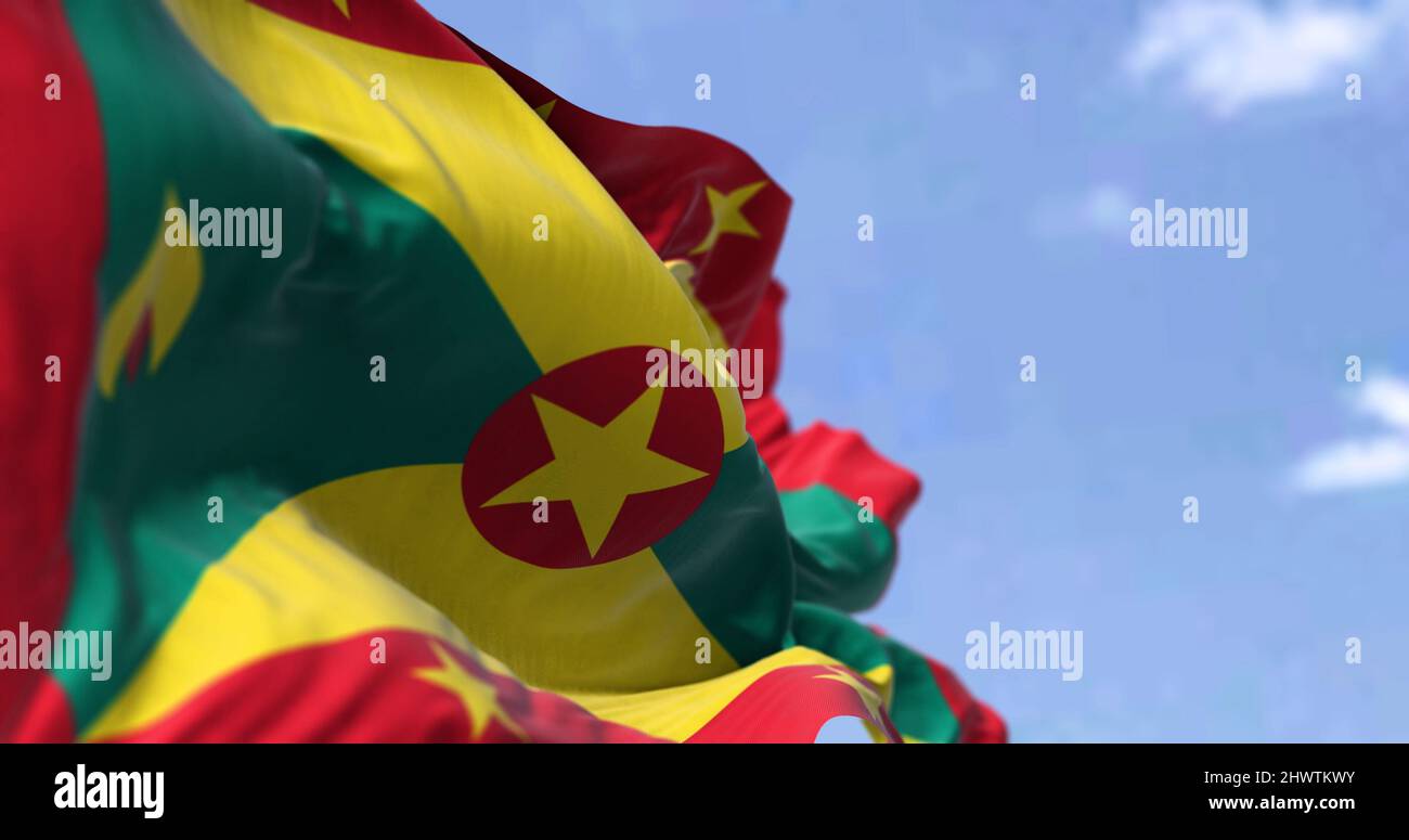 Particolare della bandiera nazionale di Grenada che ondola nel vento in una giornata limpida. Grenada è un paese insulare delle Indie Occidentali nel Mar dei Caraibi. Selezionare Foto Stock