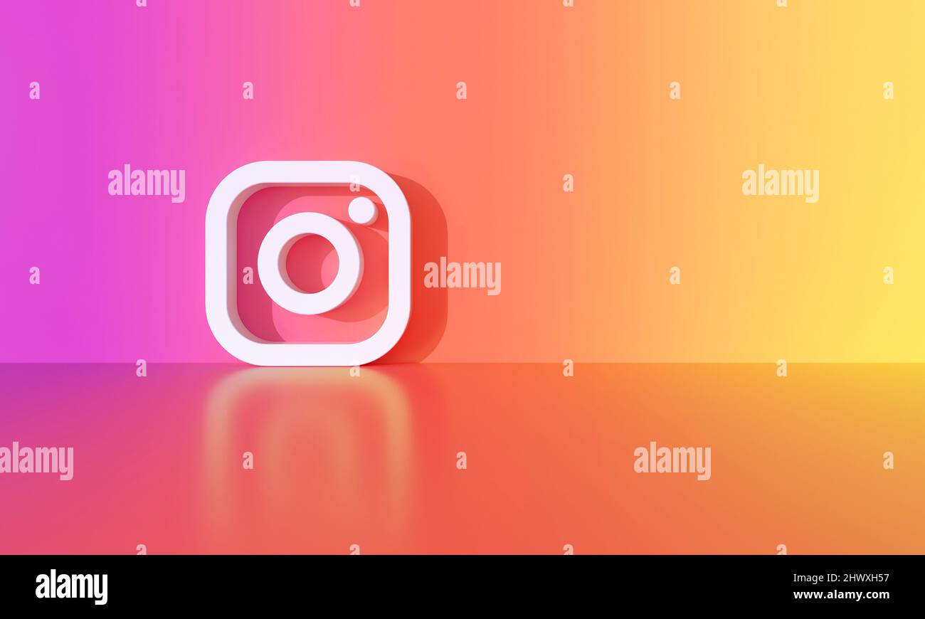 Logo Instagram sullo sfondo della parete con ombra dura e spazio per testo e grafica. Sfondo arcobaleno. 3D rendering. Foto Stock