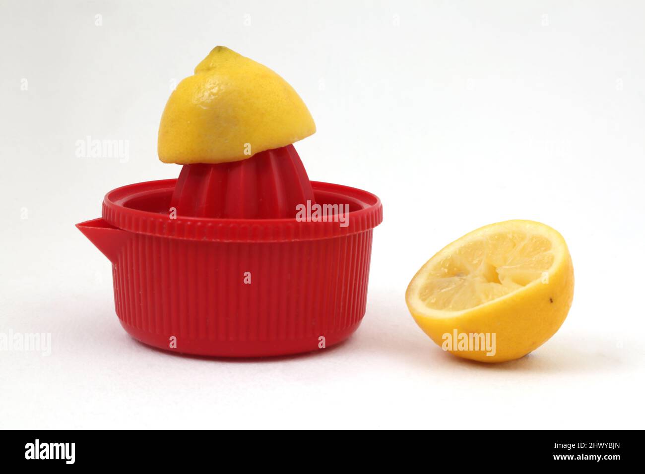 Spremiatore al limone e al limone in plastica Foto Stock