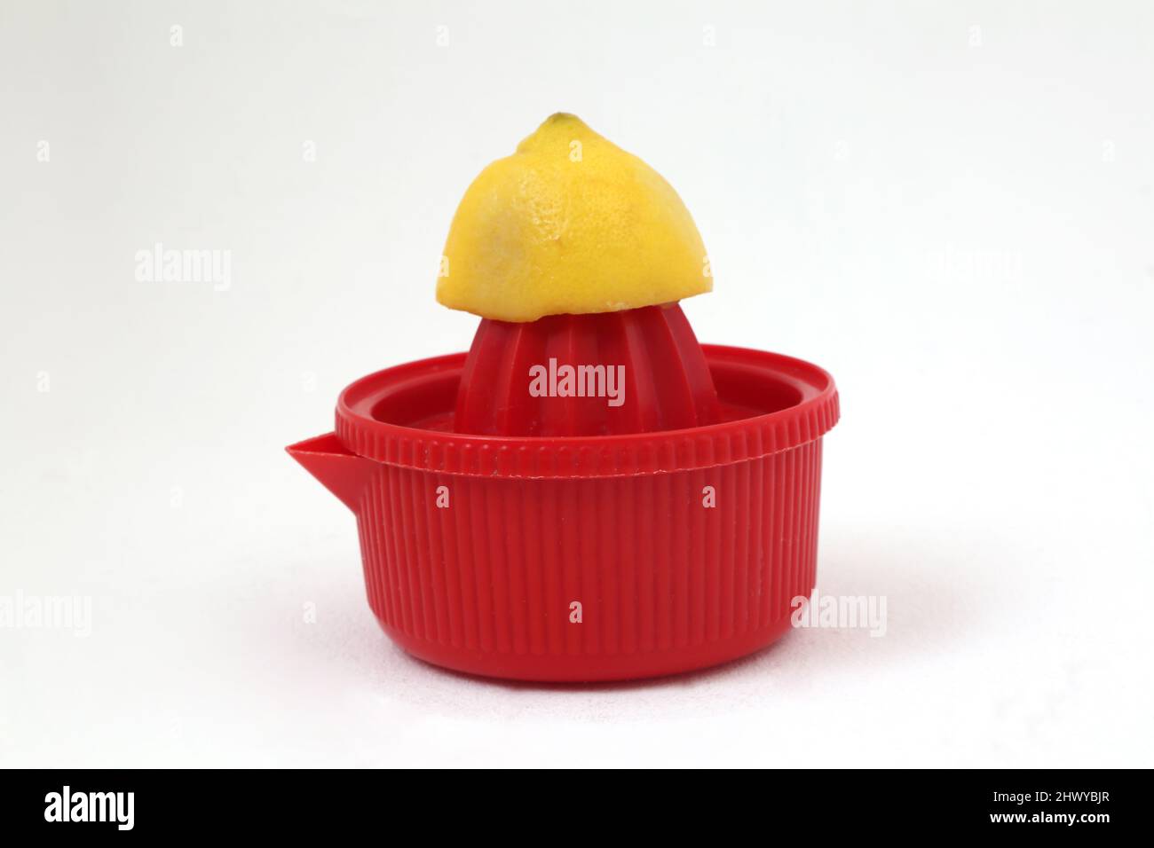 Spremiatore al limone e al limone in plastica Foto Stock
