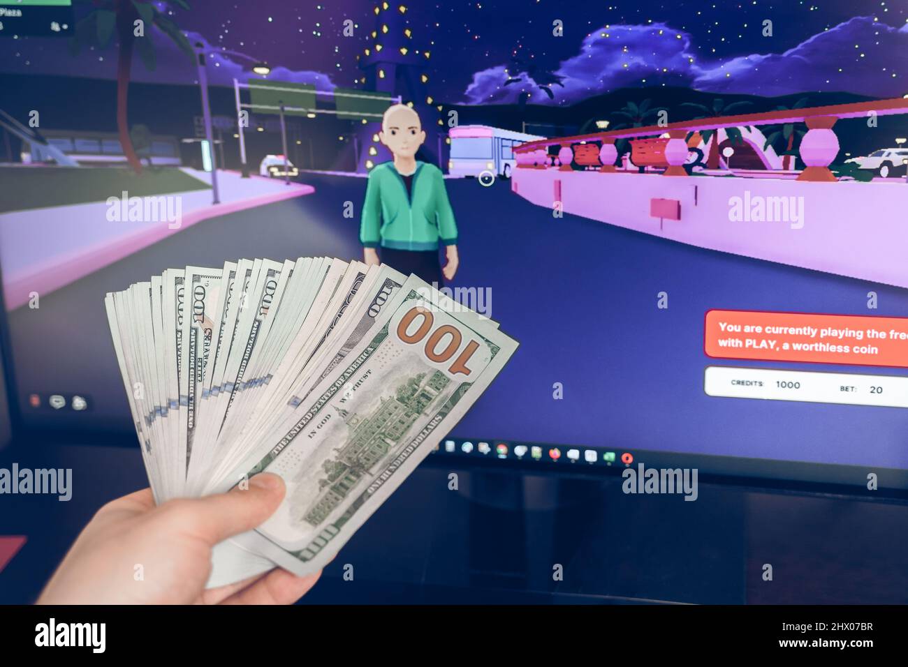 Russia Mosca 19.01.2022 Logo di metaverse. Investire nell'universo digitale, nel settore immobiliare. Acquistare terreno nel mondo virtuale. Blockchain nft Cryptocurrency.Man w Foto Stock