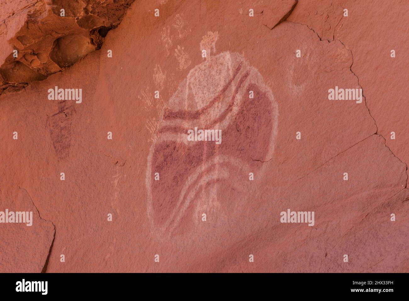 L'uomo di baseball è un antico pittogramma ancestrale Puebloan nativo americano in Chinle Wash sulla Riserva Navajo nello Utah. E 'stato dipinto più th Foto Stock