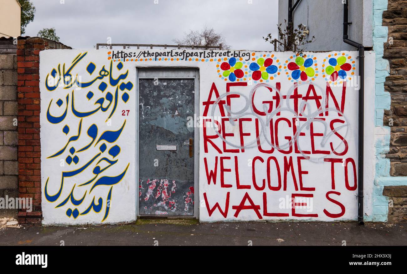 Rifugiati afghani - Benvenuti nel Galles Graffiti Foto Stock