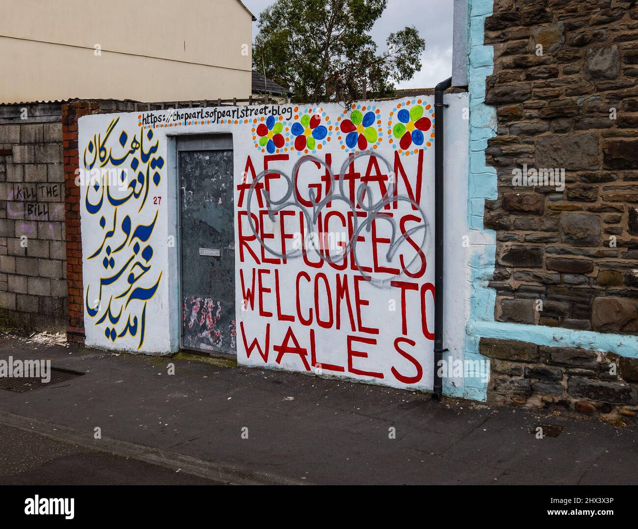Cartello di benvenuto dei rifugiati di guerra in Galles Foto Stock