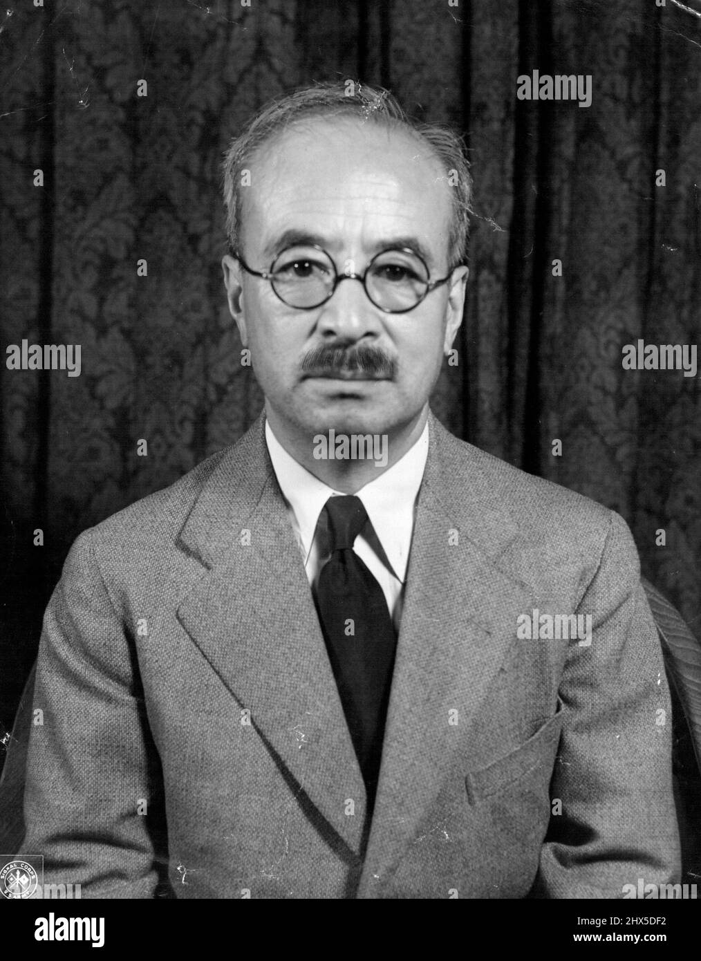 Presunto maggiore criminale di guerra giapponese : Koichi Kido, uno dei 25 presunti principali criminali di guerra giapponesi in processo presso il Tribunale militare Internazionale per l'Estremo Oriente, Tokyo, Giappone. Ministro del gabinetto sotto Konoye e Hiranuma, Kido fu custode del sigillo privato dal 1940 al 1945, e consigliere capo riservato all'imperatore e presidente delle riunioni degli ex-premiers. Agosto 25, 1947. (Foto di Skinner, U.S. Army Signal Corps). Foto Stock