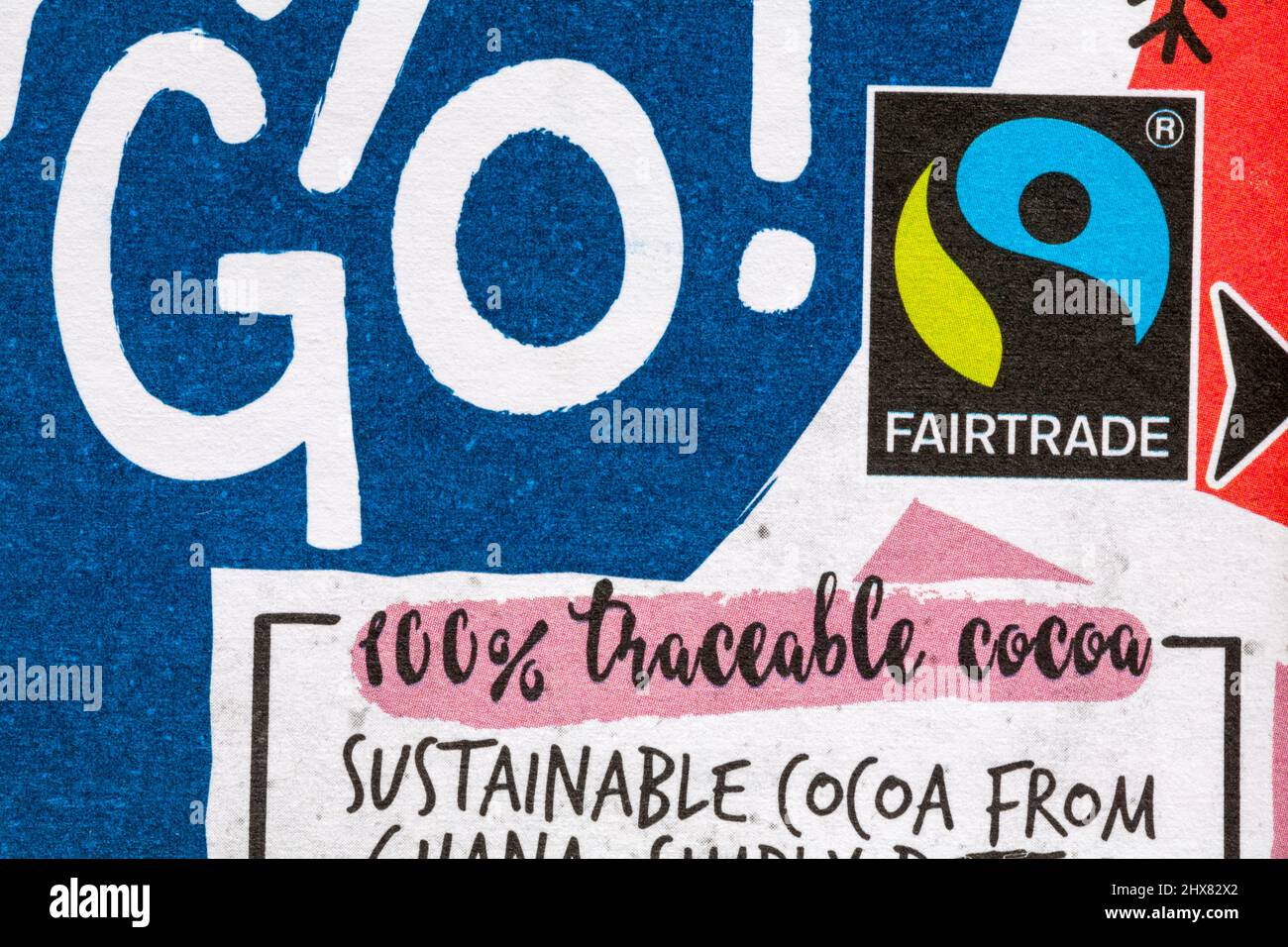 Fairtrade logo Fairtrade simbolo sulla strada per andare fondina di cioccolato fondente Carre da Lidl - Fair Trade 100% cacao tracciabile Foto Stock