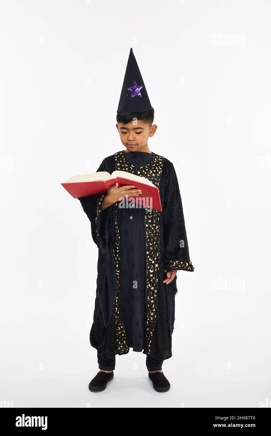 Kid/modello nel costume di wizard Foto Stock