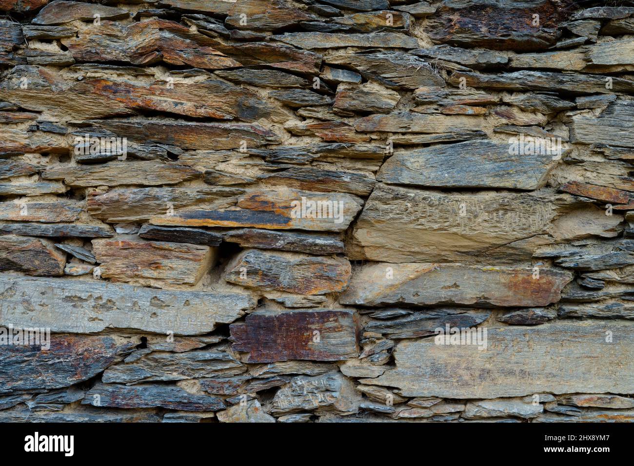Pietra e muro di argilla texture. Pietra sfondo con argilla. Foto Stock