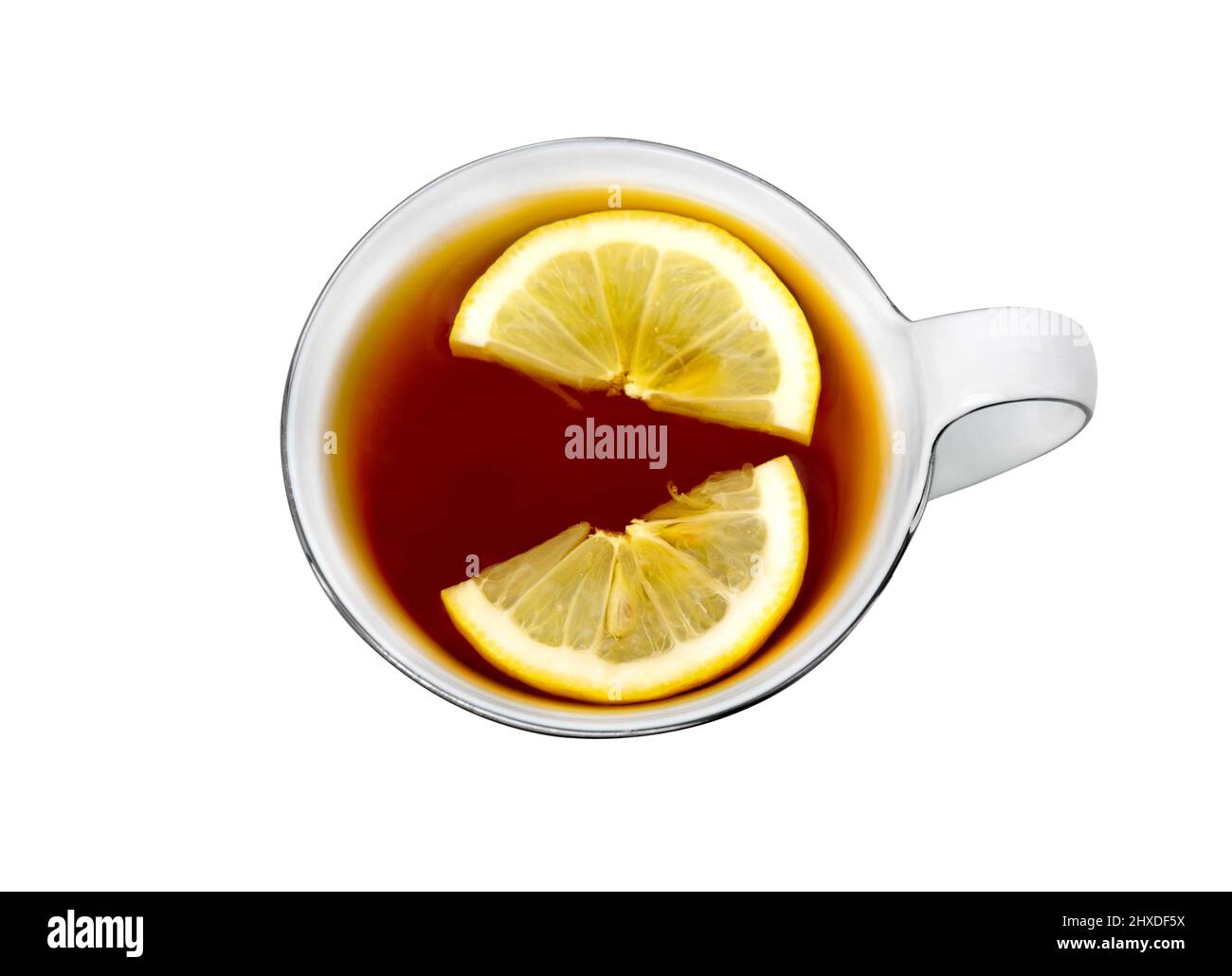 Tè con vista dall'alto della fetta di limone. Tazza di tè nero isolato su sfondo bianco. Foto Stock