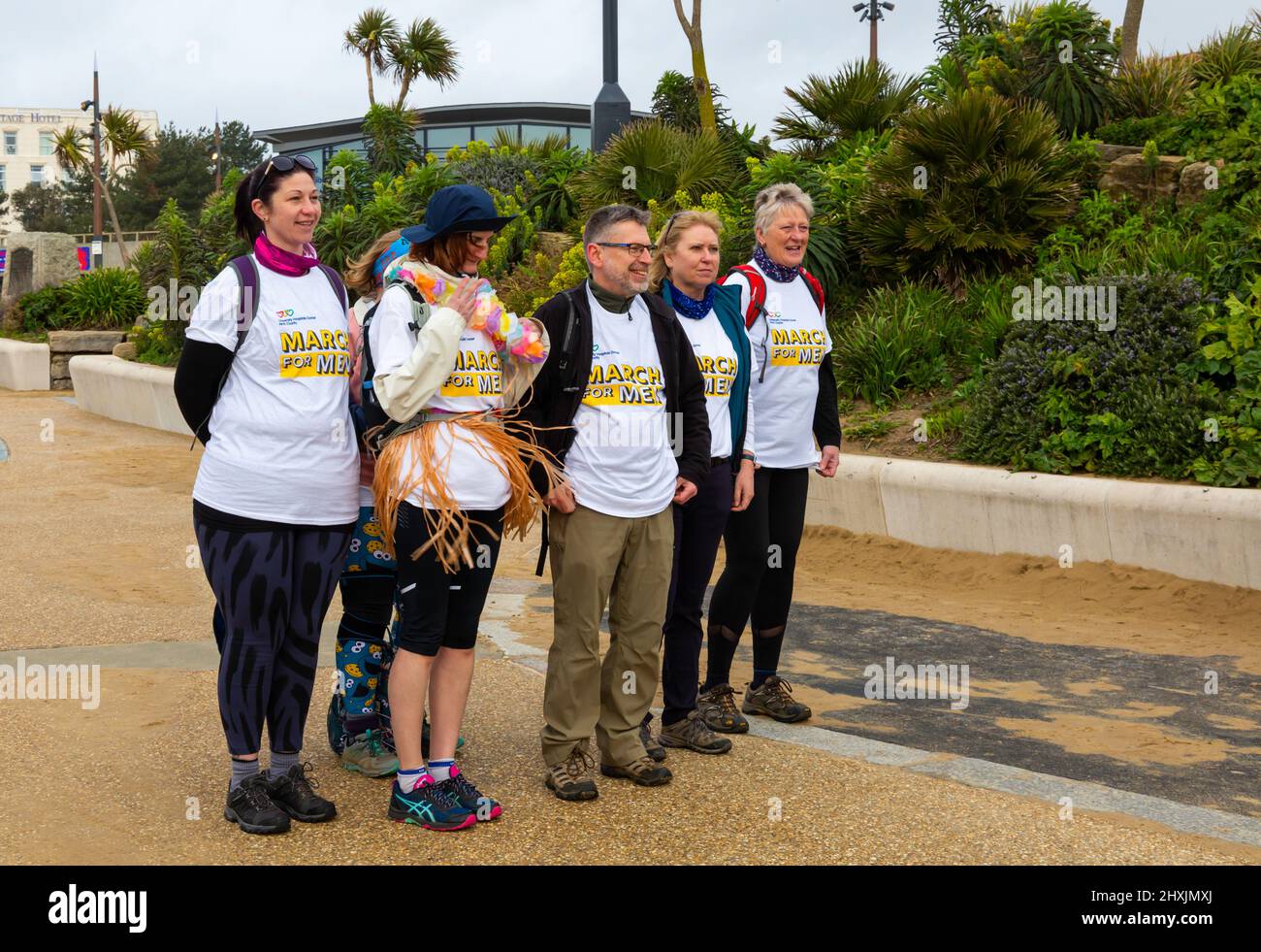 Bournemouth, Dorset, UK. 13th March, 2022. March for Men - men of all generations, sons, fathers, brothers, uncles, grandfathers, as well as women, girls and dogs, gather in Bournemouth to walk, jog or run 1km, 5km or 10km, organised by Bournemouth Hospital Charity. It highlights health concerns men face such as prostate or testicular cancer. The fundraising event helps raise funds to support treatment and new equipment to improve care. Credit: Carolyn Jenkins/Alamy Live News Foto Stock