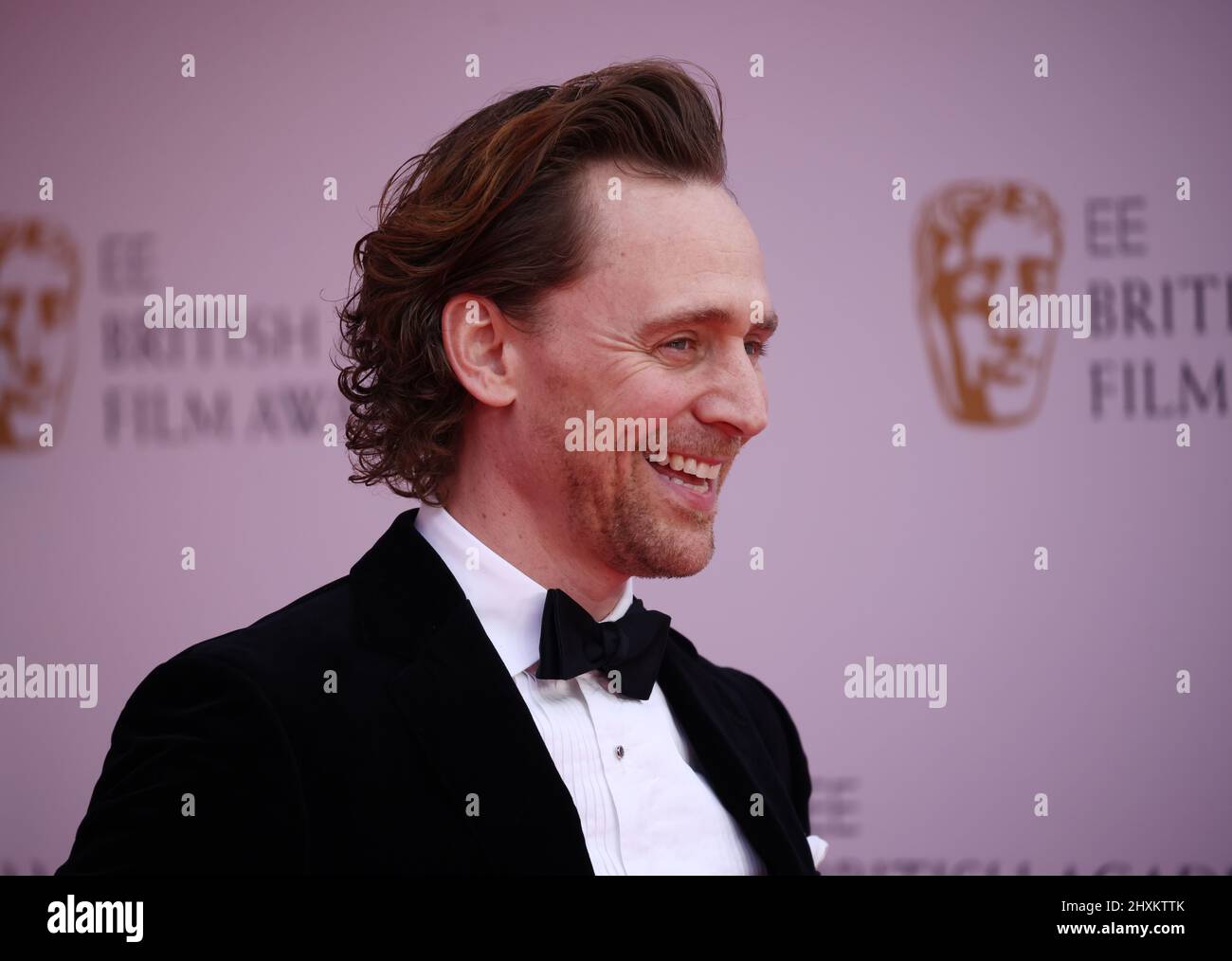 Tom Hiddleston arriva alla British Academy of Film and Television Awards (BAFTA) del 75th presso la Royal Albert Hall di Londra, Gran Bretagna, 13 marzo 2022. REUTERS/Henry Nicholls Foto Stock