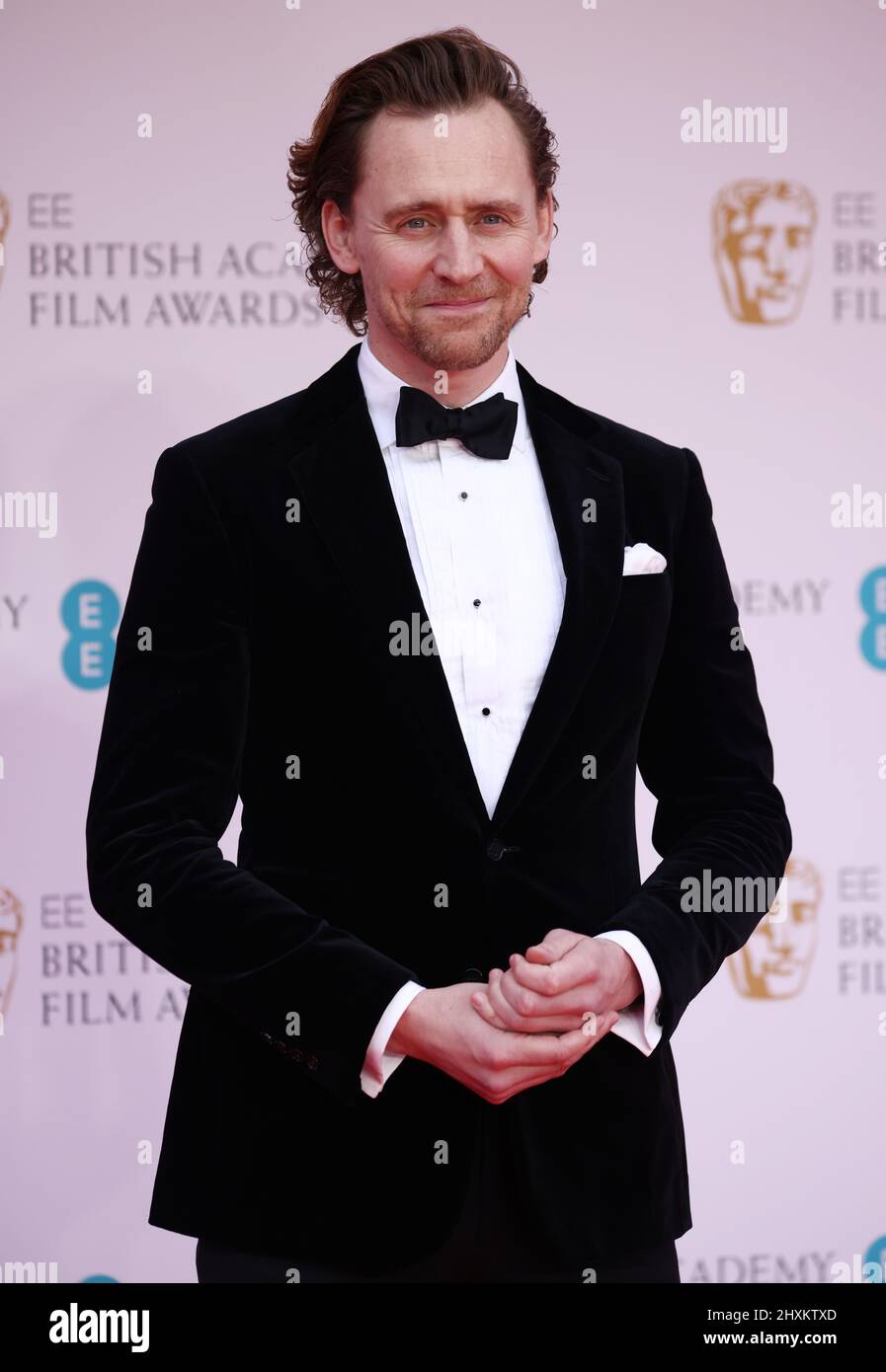 Tom Hiddleston arriva alla British Academy of Film and Television Awards (BAFTA) del 75th presso la Royal Albert Hall di Londra, Gran Bretagna, 13 marzo 2022. REUTERS/Henry Nicholls Foto Stock