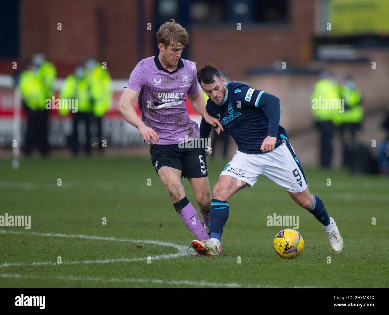 13th marzo 2022 ; Dens Park, Dundee, Scozia: Scottish Cup Football, Dundee contro Rangers; Danny Mullen di Dundee prende Filip Helander di Rangers Foto Stock