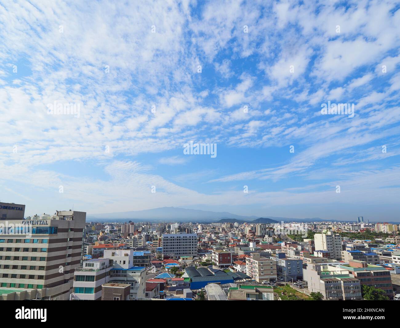 Jeju City in giornata di sole Foto Stock