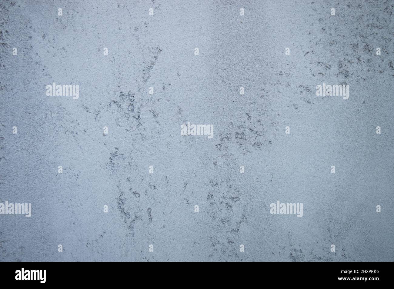 Sfondo grigio astratto con punti più scuri Foto Stock