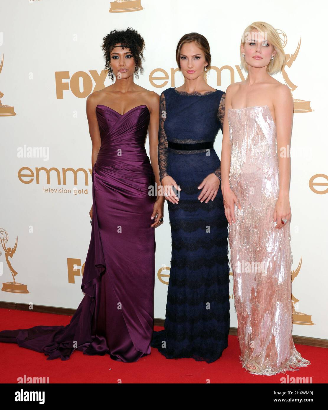 Annie Ilonzeh, Minka Kelly e Rachael Taylor partecipano al Primetime Emmy Awards 63rd che si tiene al Nokia Theatre L.A. a Los Angeles, California, USA. Foto Stock