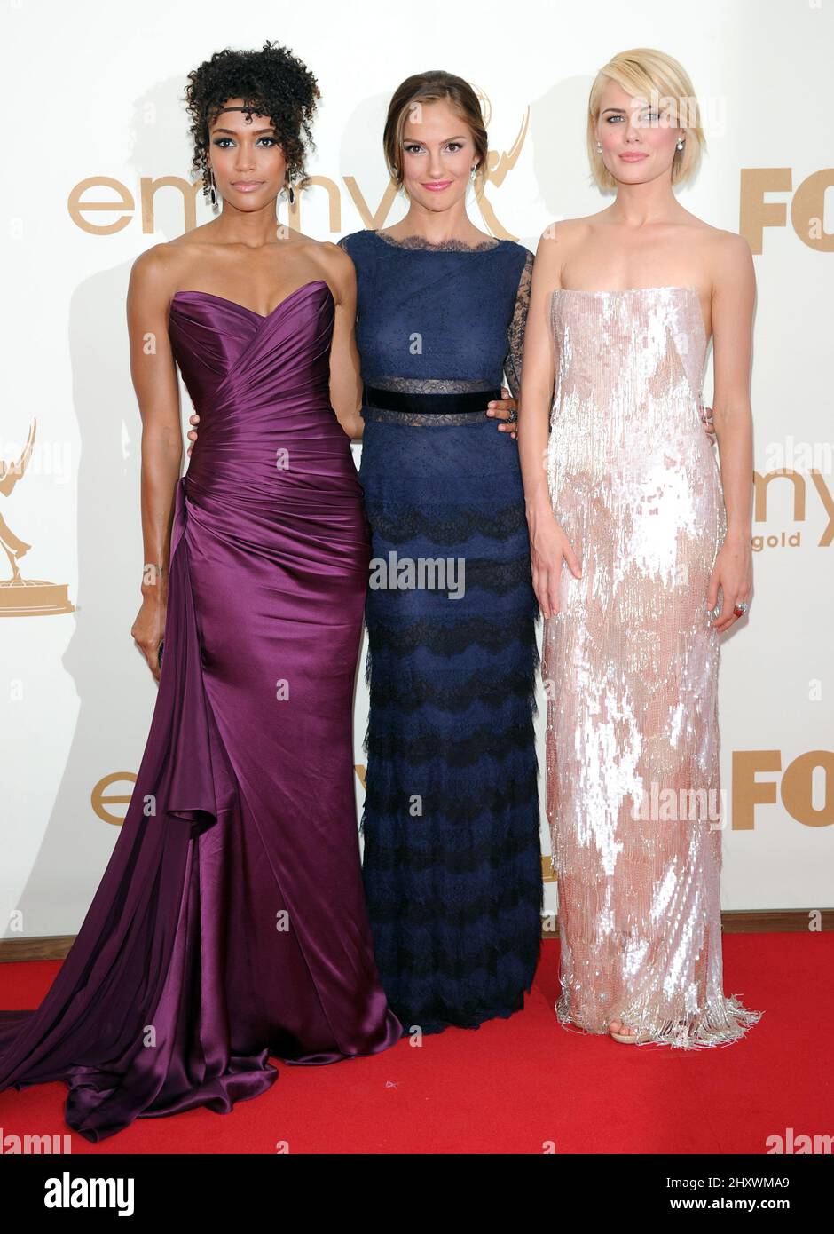 Annie Ilonzeh, Minka Kelly e Rachael Taylor partecipano al Primetime Emmy Awards 63rd che si tiene al Nokia Theatre L.A. a Los Angeles, California, USA. Foto Stock