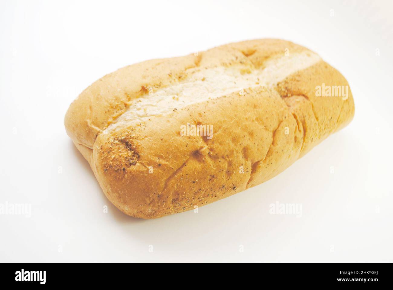 Un nuovo filone di pane italiano su bianco Foto Stock