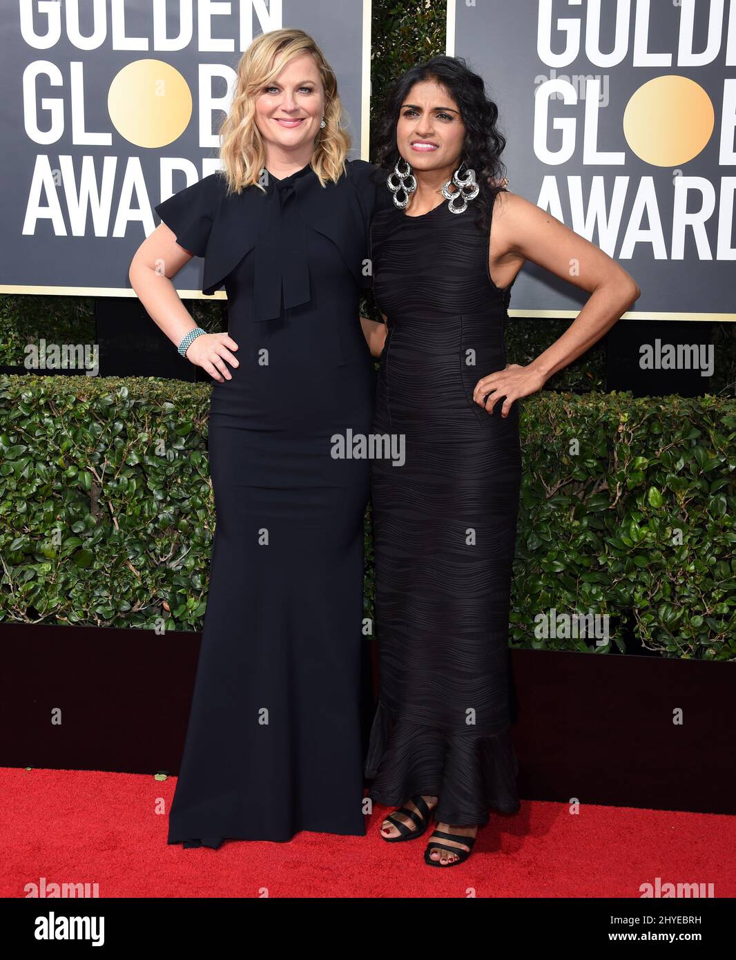 Amy Poehler, Saru Jayaraman al Golden Globe Awards 75th che si tiene al Beverly Hilton Hotel il 7 gennaio 2018 a Beverly Hills, CA Foto Stock