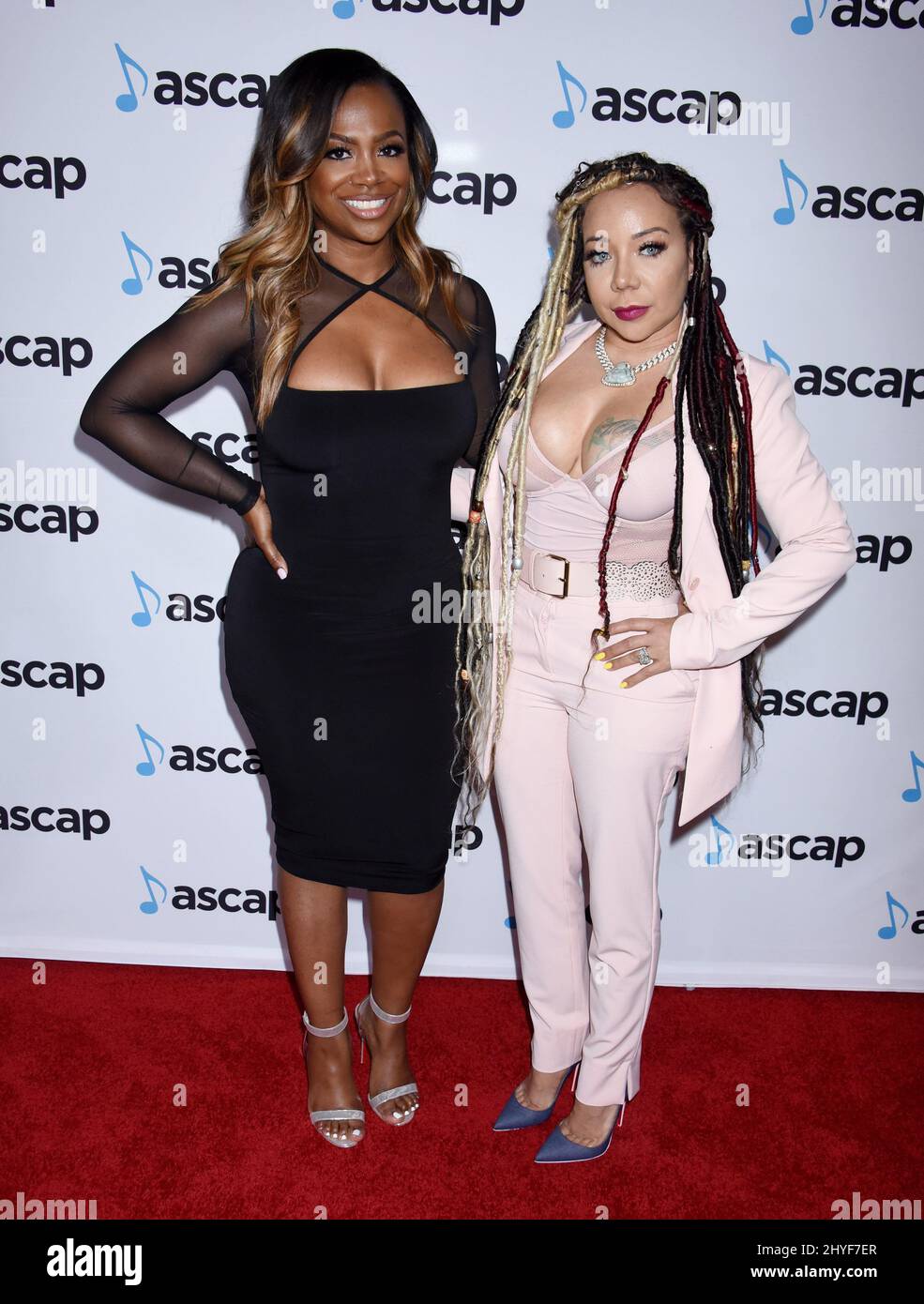Kandi Burruss e Tameka 'Tiny' Harris partecipano agli ASCAP Pop Music Awards 2018, che si tengono al Beverly Hilton Hotel di Beverly Hills, California Foto Stock