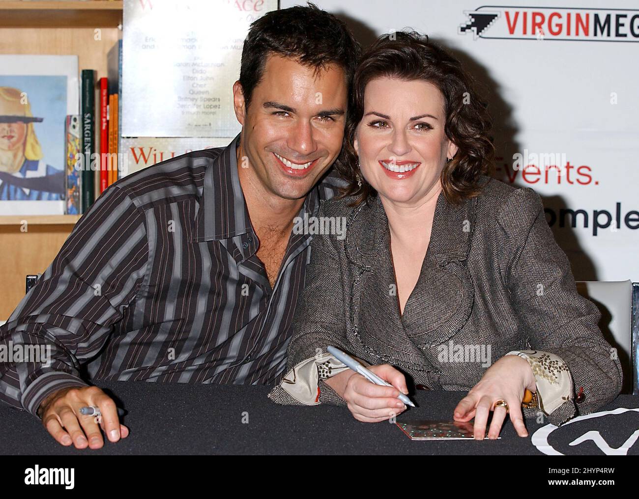 Eric McCormack & Megan Mullally partecipa a un CD 'Will & Grace: Let the Music out' firmato a West Hollywood. Foto: UK Stampa Foto Stock