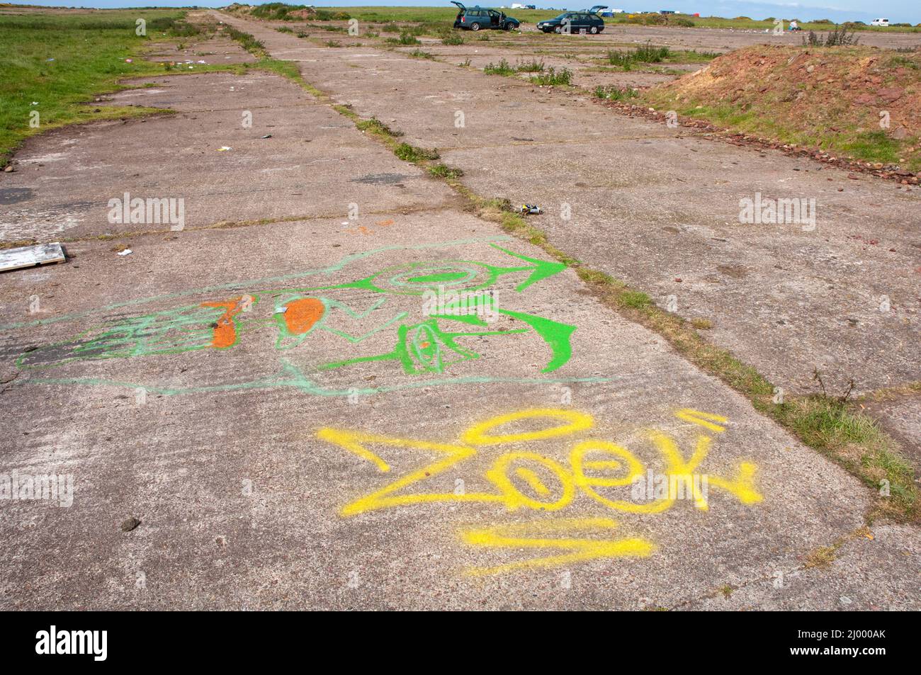 Graffiti, illegal Rave, Dale Airfield, maggio 2010, Pembrokeshire, Galles, Regno Unito, Europa Foto Stock