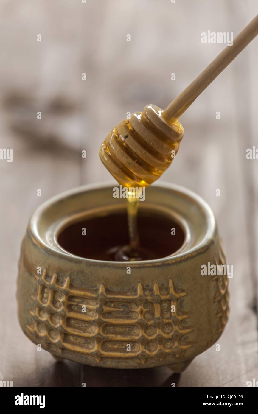 Primo piano di miele biologico sano Foto Stock