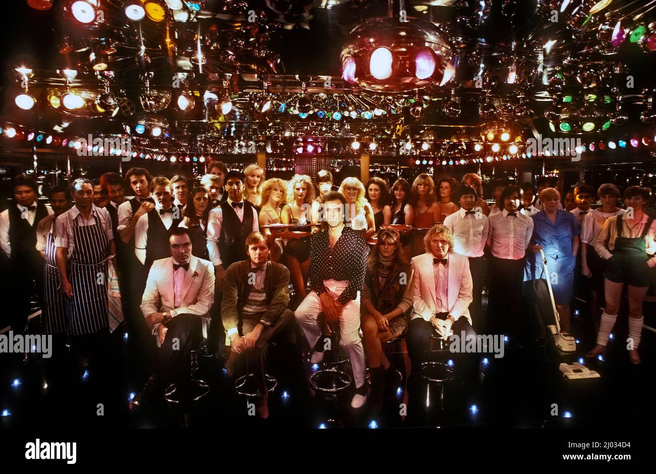 Perter Stringfellow con lo staff dell'Ippodromo di Londra 1982 Foto Stock