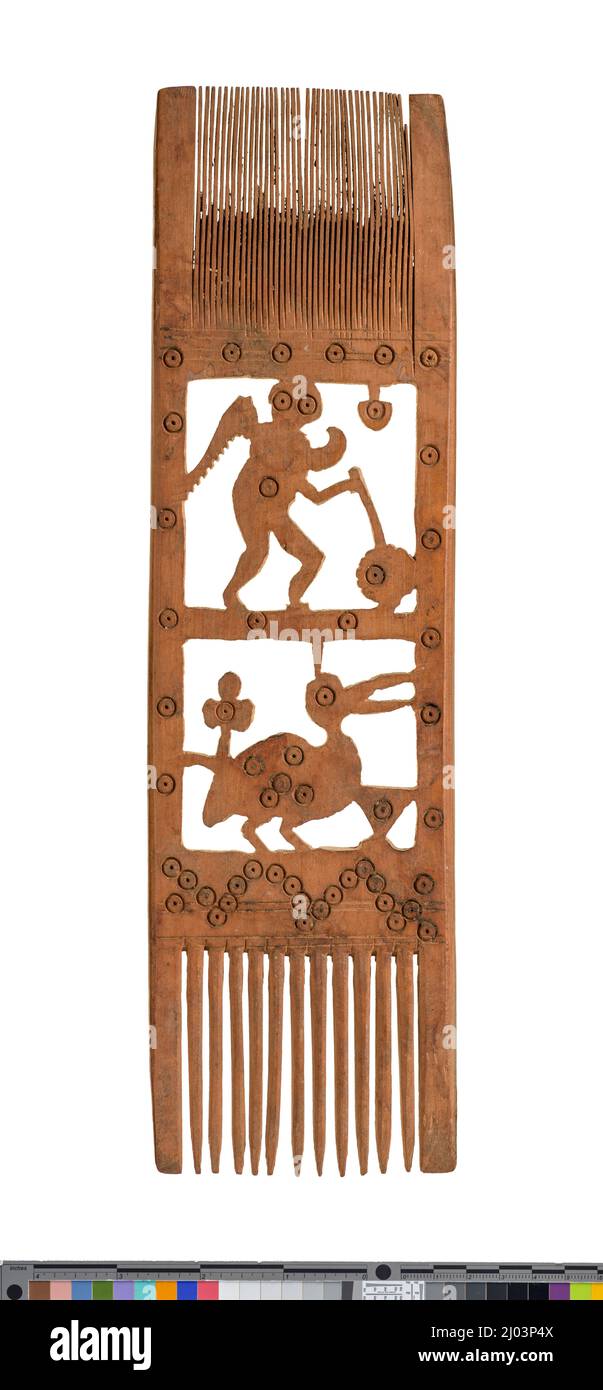 Pettine di legno raffigurante una figura umana. Egitto, 4th - 8th secolo CE. Strumenti e attrezzature; pettini. Legno Foto Stock