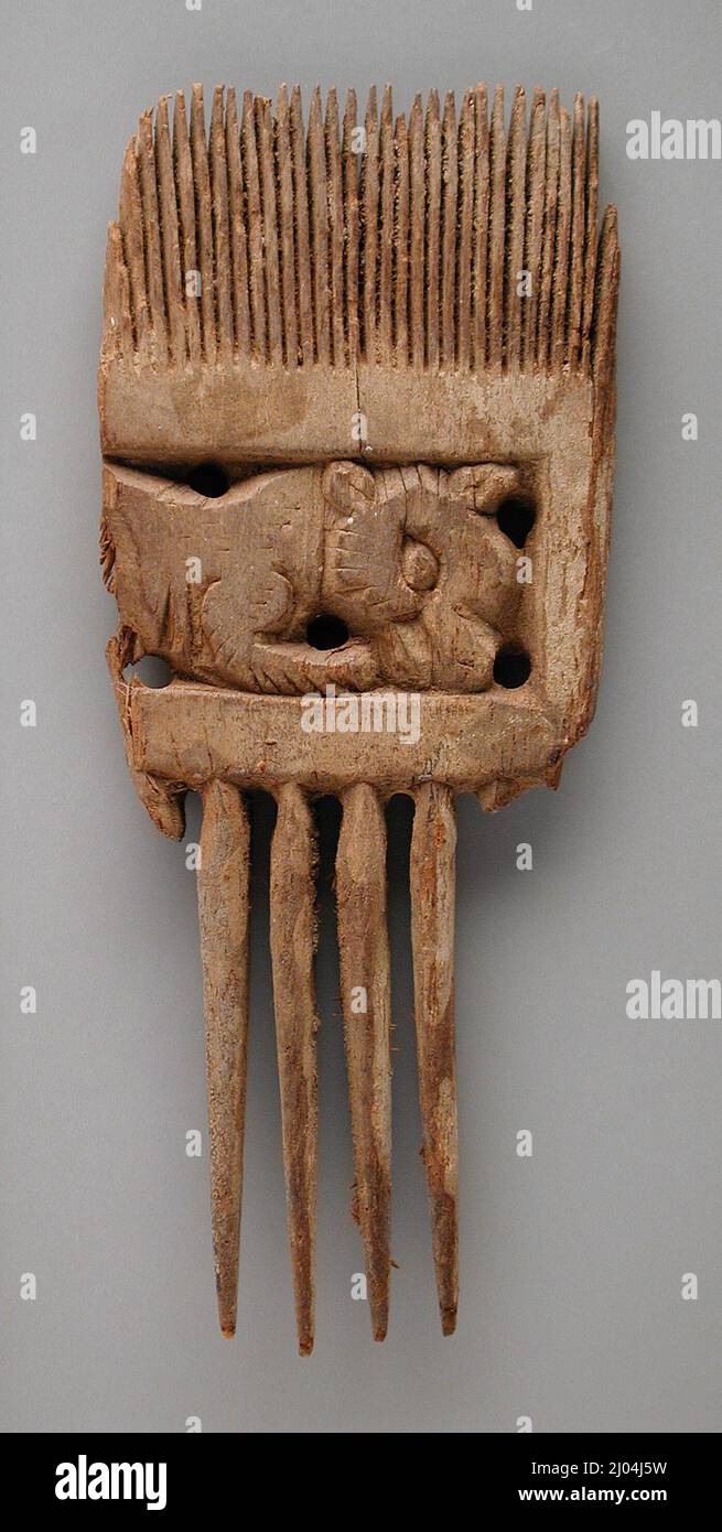 Pettine di legno raffigurante un Leone (?). Egitto, 4th - 8th secolo CE. Strumenti e attrezzature; pettini. Legno Foto Stock