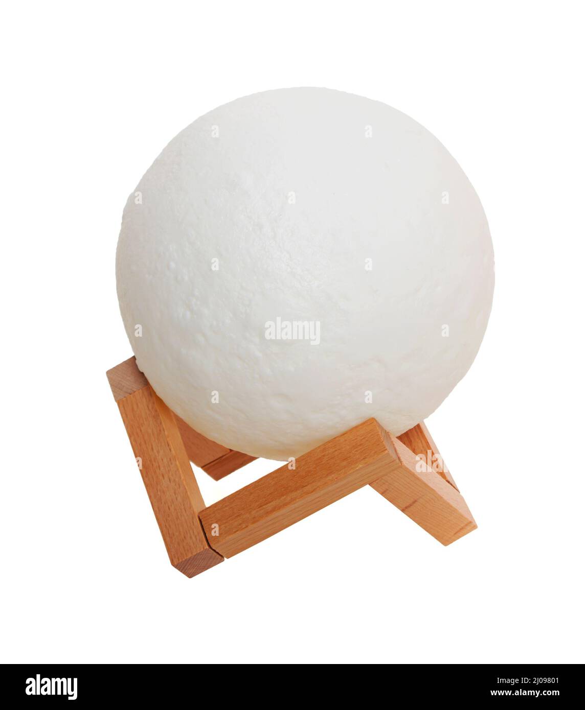 lampada moon su un supporto in legno su sfondo bianco isolato Foto Stock