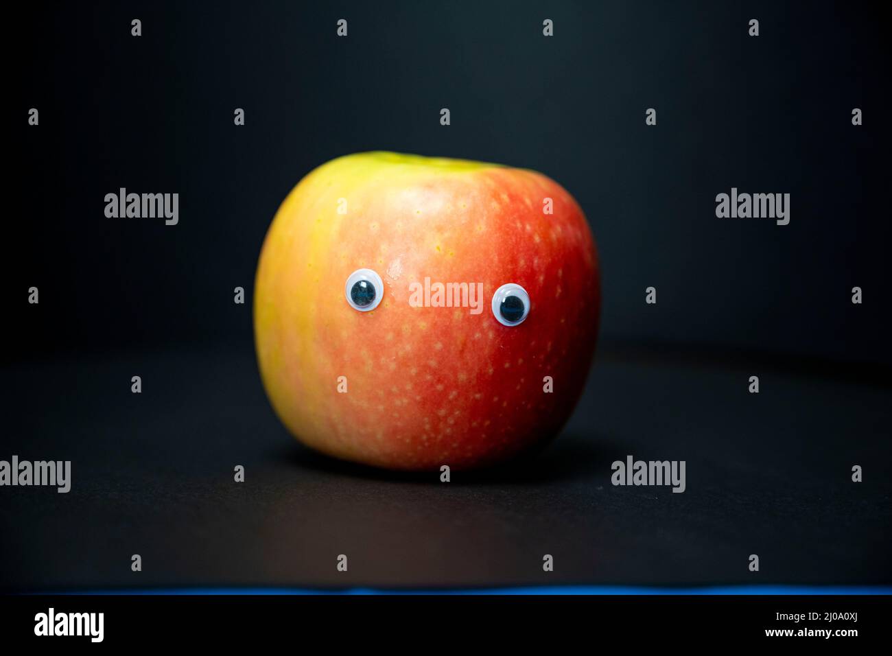 pomme avec des yeux Foto Stock